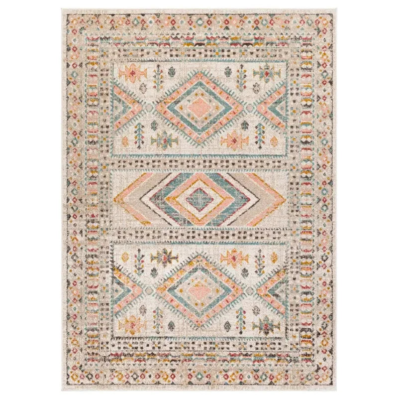 Boho-style area rug with geometric diamond patterns, perfect for van life interiors and cozy camper decor.
