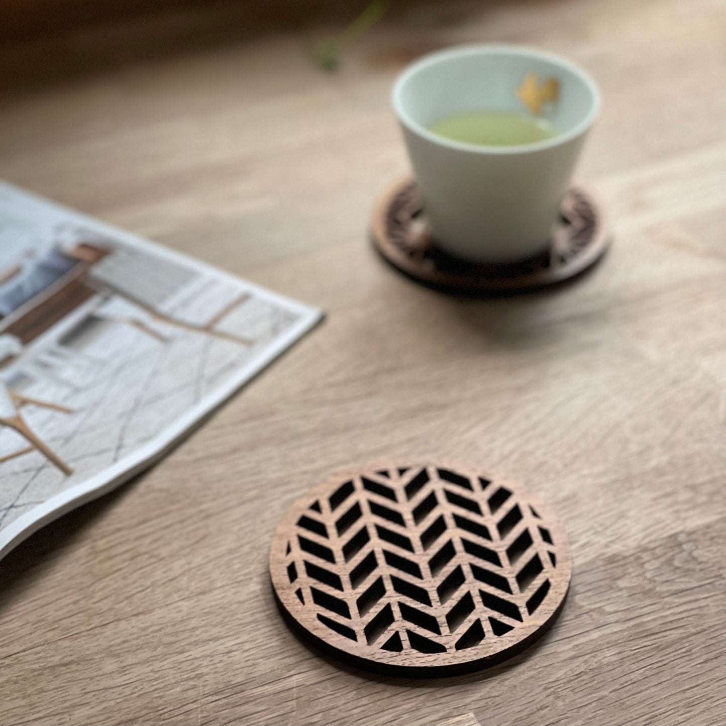 Wooden coasters with geometric cutout design for van life, camper van accessories, and outdoor adventures