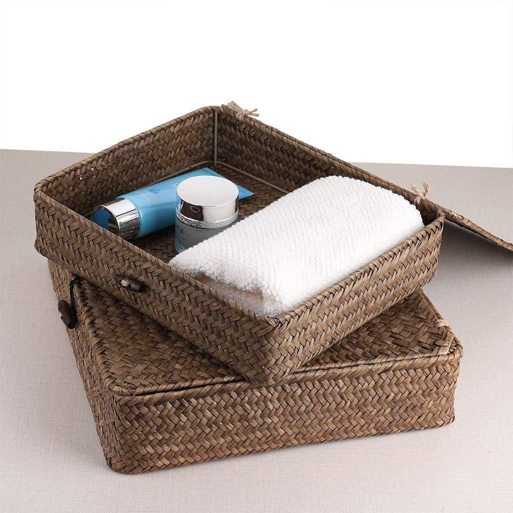 Woven rattan storage basket with lid, holding towel and toiletries, ideal for van life organization