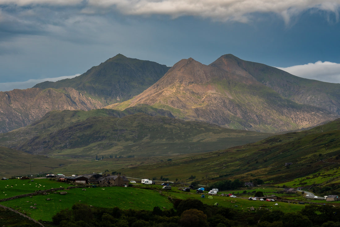Campervans beneath the mountains of Eryri in Wales