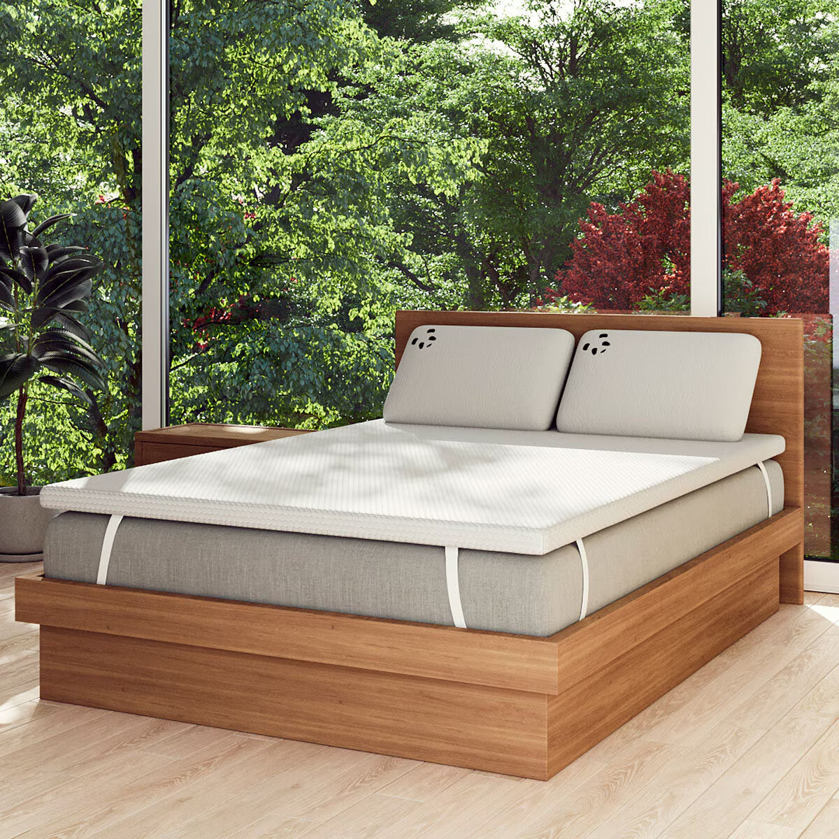 Van life mattress topper on wooden bed frame with pillows, ideal for camper van comfort and outdoor adventures