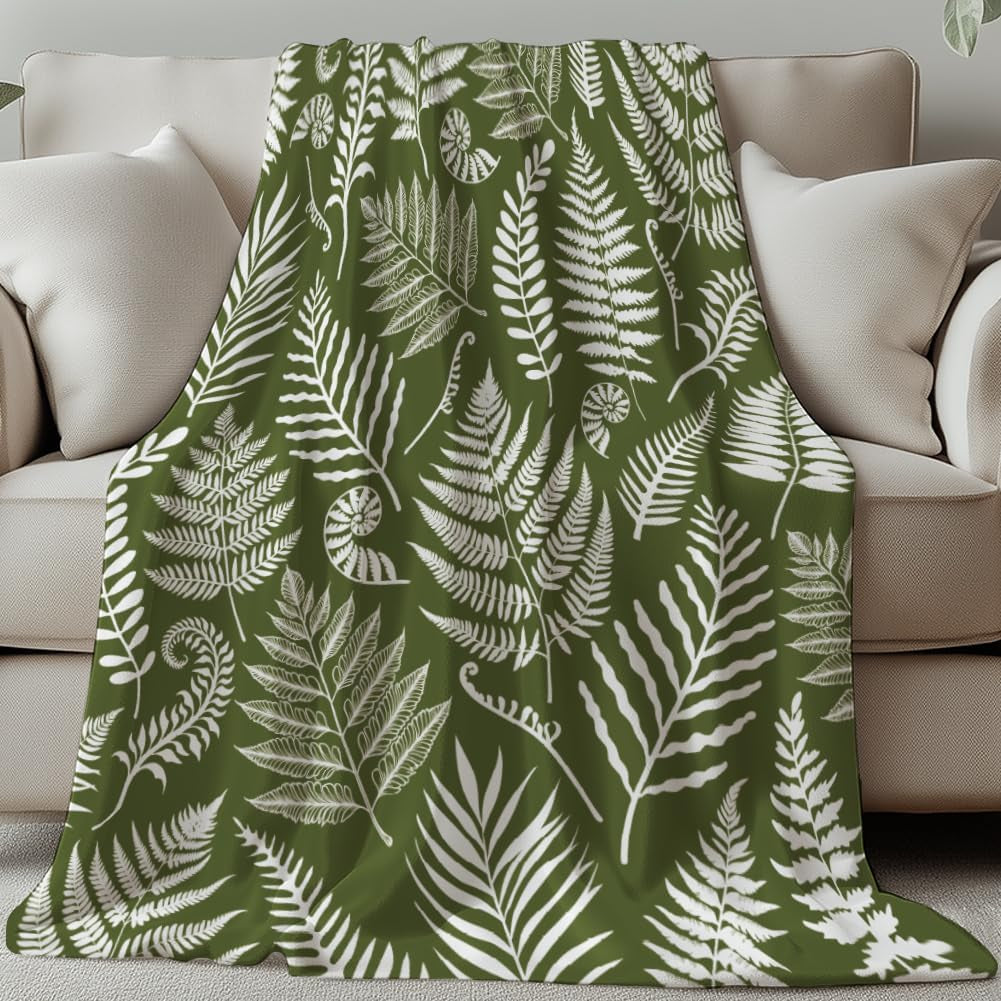Green Fern Flannel Throw – 150 × 130cm – fern throw draped over a sofa