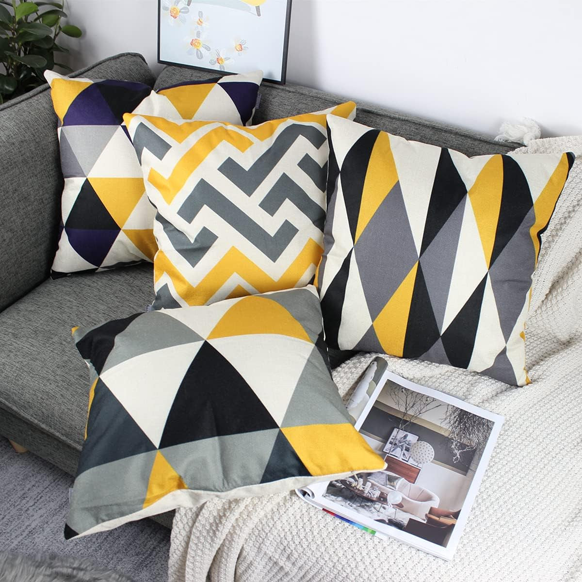 Yellow & Grey Geometric Cushion Covers – 4 Pack, 45cm – cushions on a grey sofa
