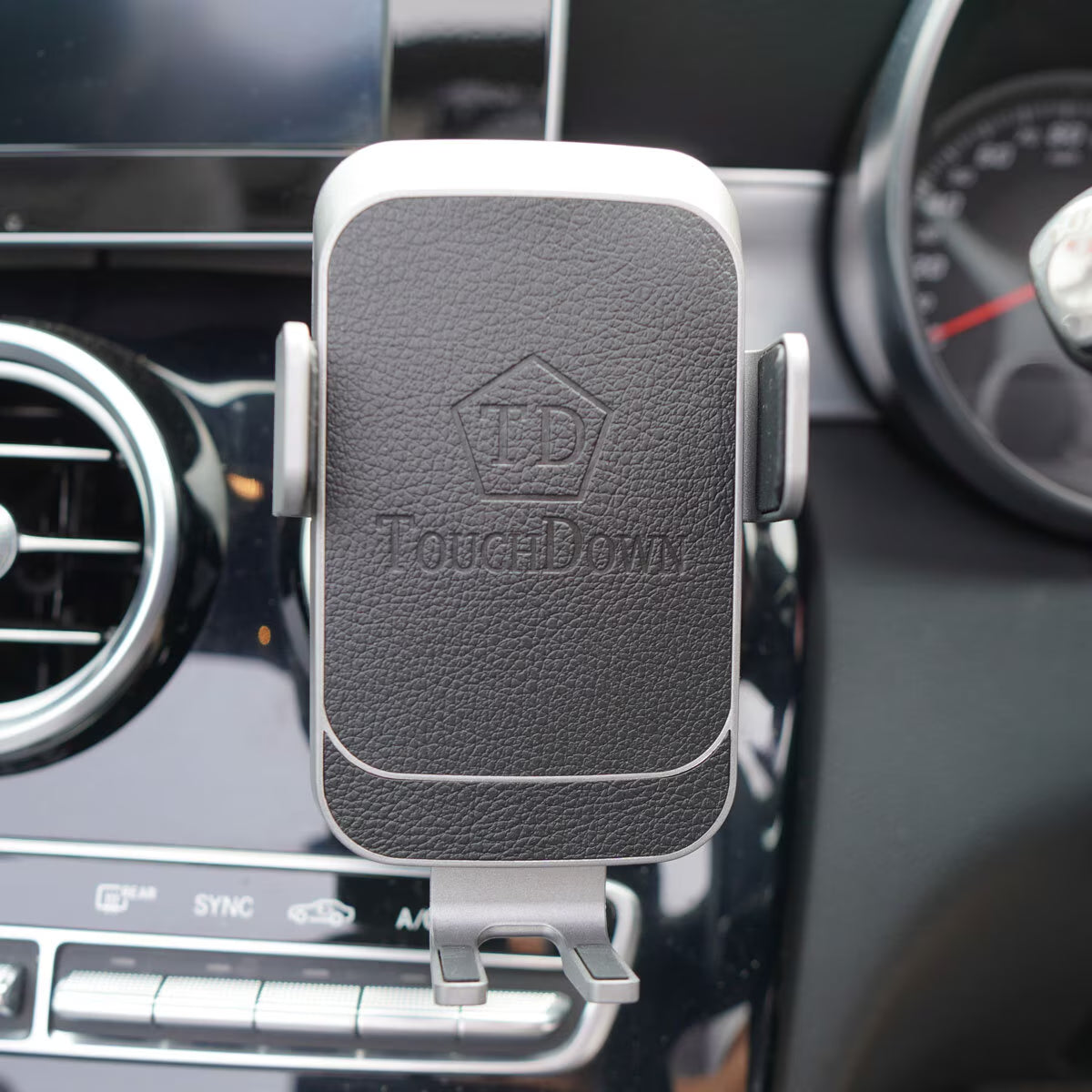 TouchDown car phone mount for van life adventures, securely holds phone on dashboard