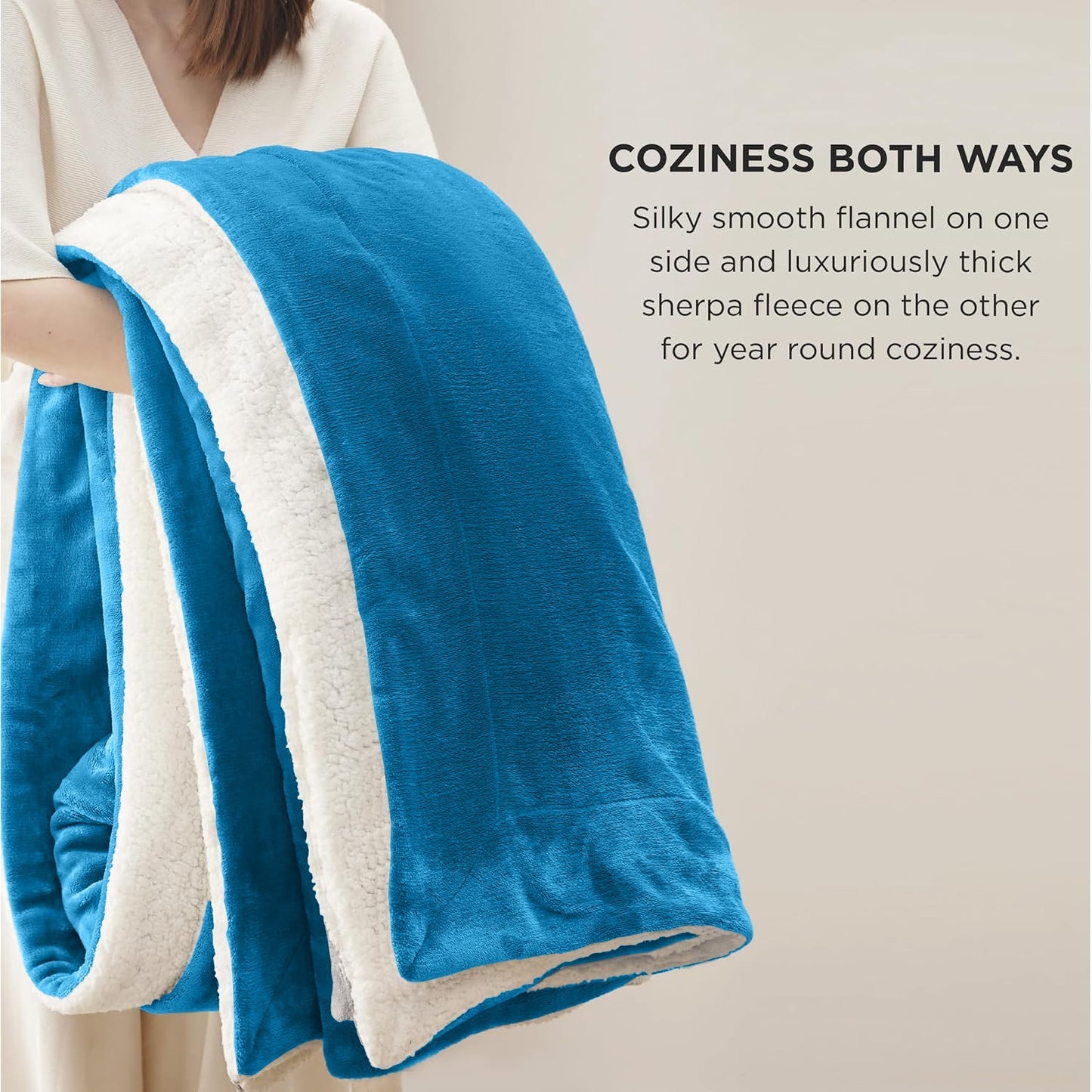 Cozy reversible van life blanket: blue flannel and white sherpa fleece for year-round comfort