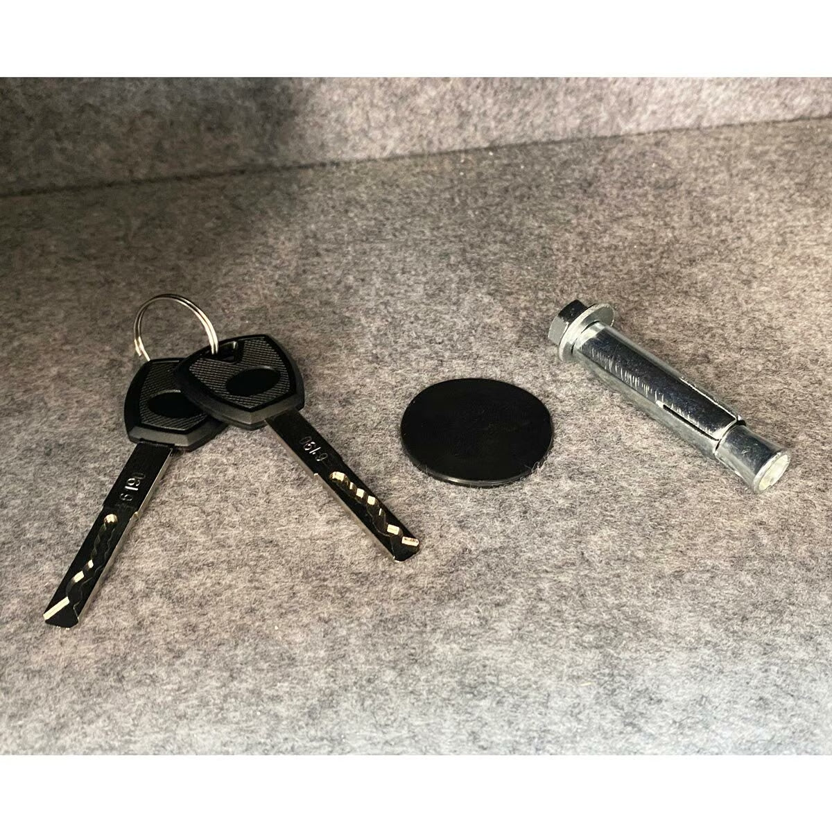 Van life security lock kit with keys, cover plate, and anchor bolt for camper van storage