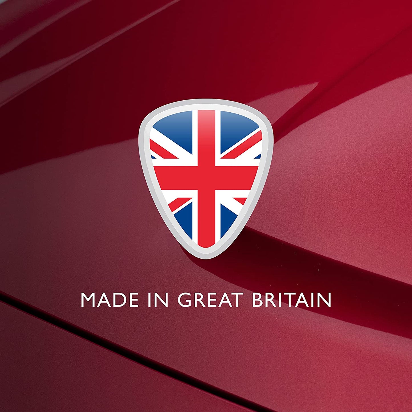 Made in Great Britain badge with Union Jack flag on red van surface