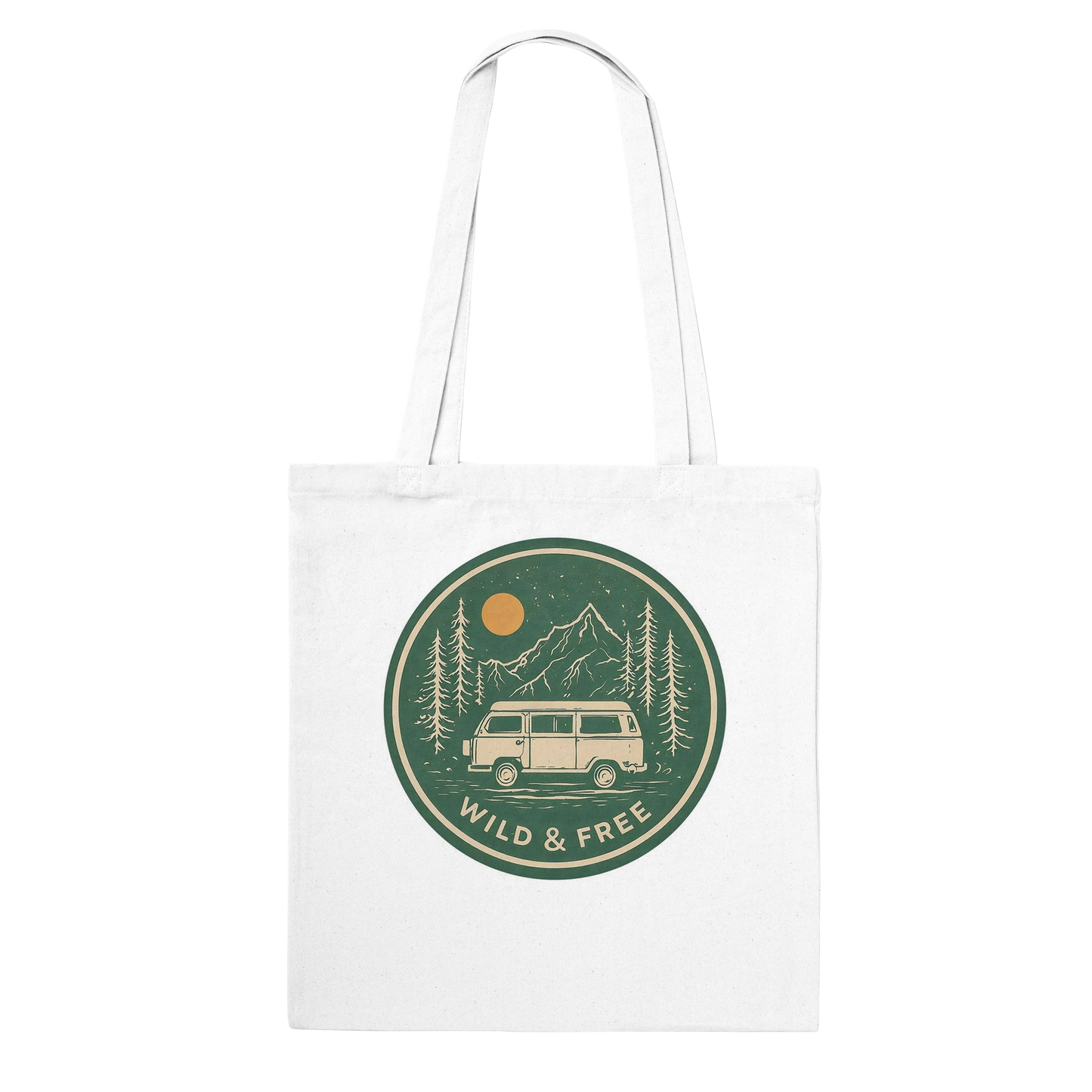 White canvas tote bag with 'Wild & Free' van life design, mountains, trees, and sunset graphic for outdoor adventures.