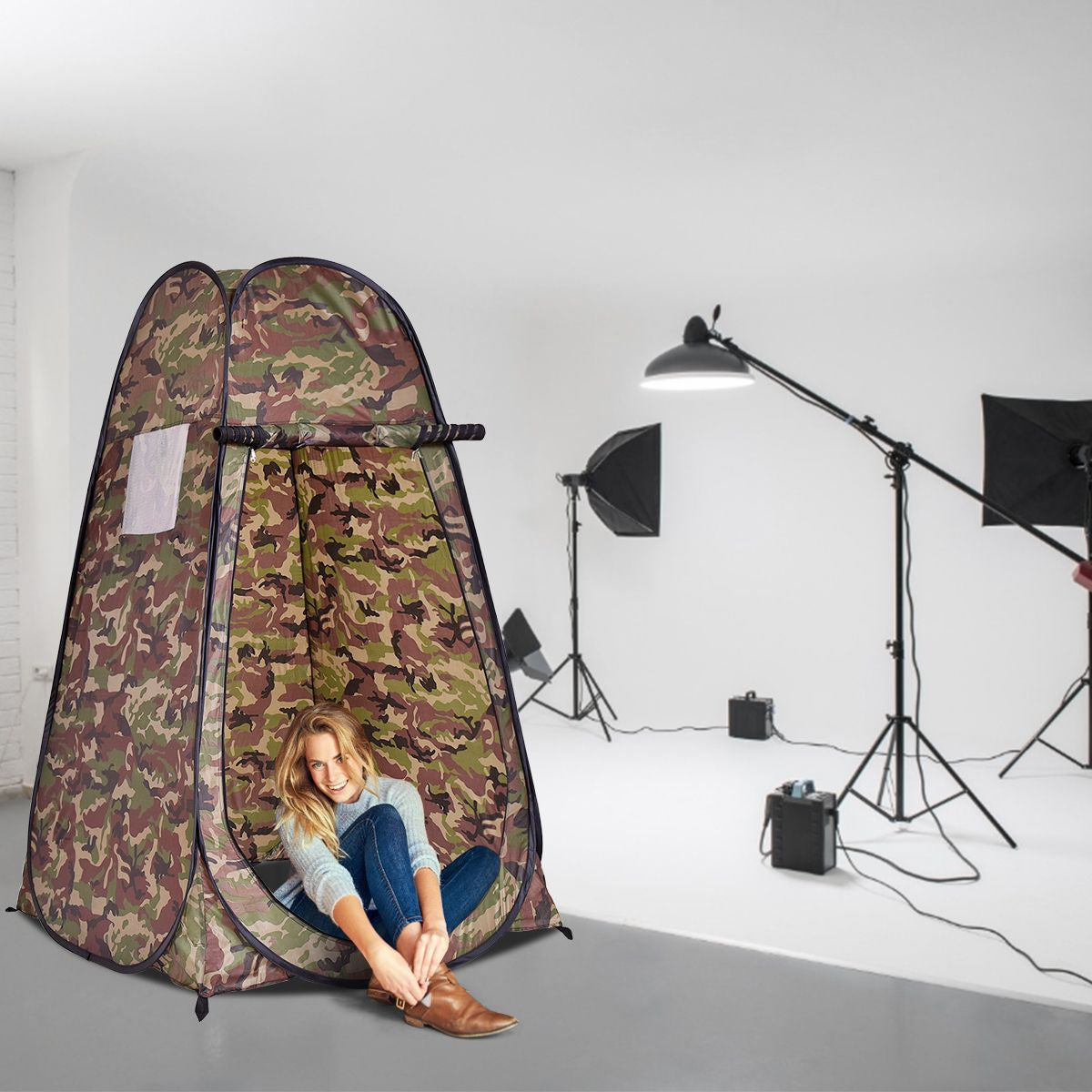 Camouflage pop-up privacy tent for van life, camping, or outdoor adventures with woman sitting inside