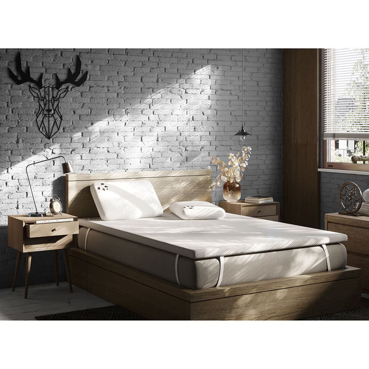 Van life mattress topper on wooden bed frame with pillows, ideal for camper van comfort and outdoor adventures.