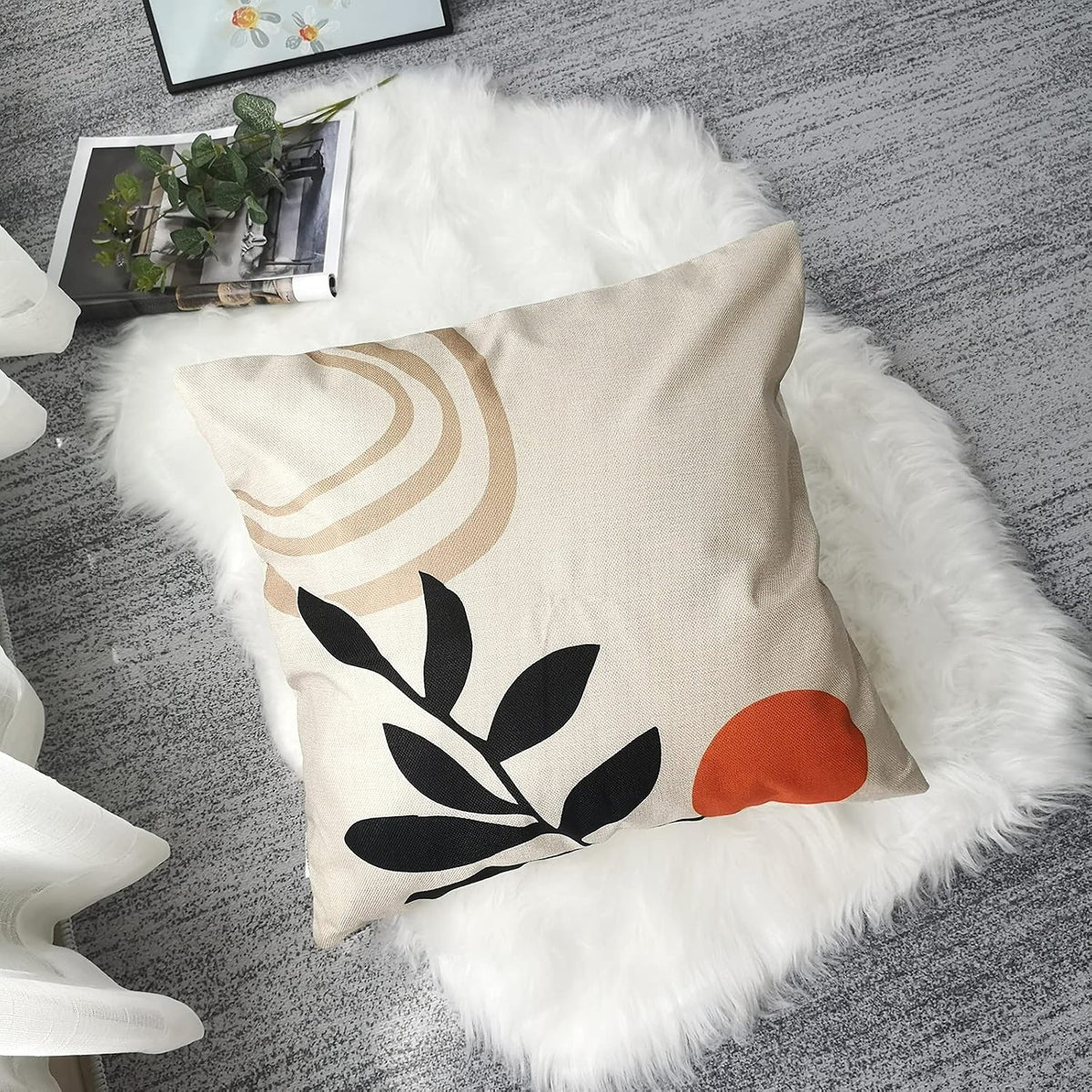 Orange Botanical Cushion Covers – 4 Pack, 50cm – single botanical cushion on a sofa