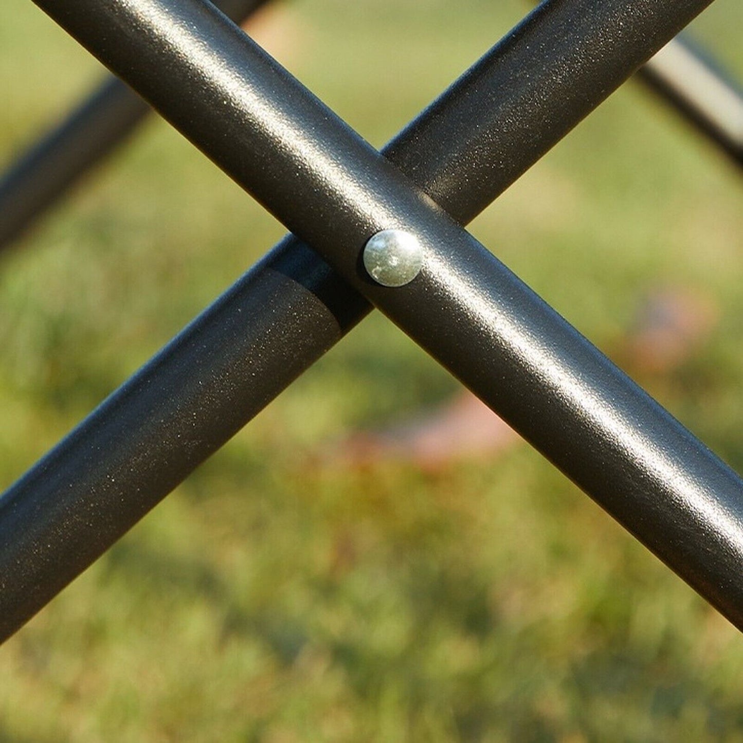Sturdy black metal frame joint with rivet, ideal for van life camping gear and outdoor adventures.