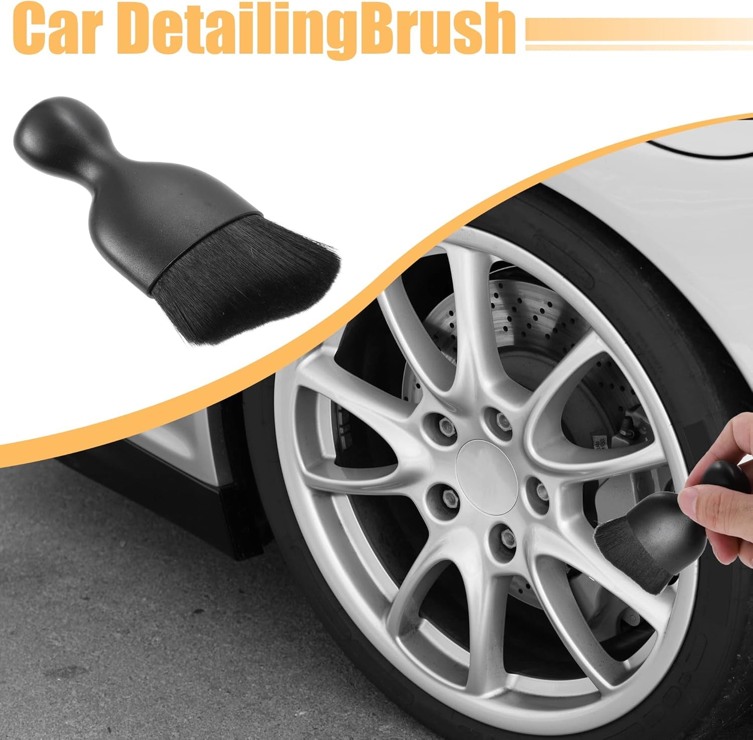 Black car detailing brush cleaning alloy wheel, perfect for van life and car care essentials