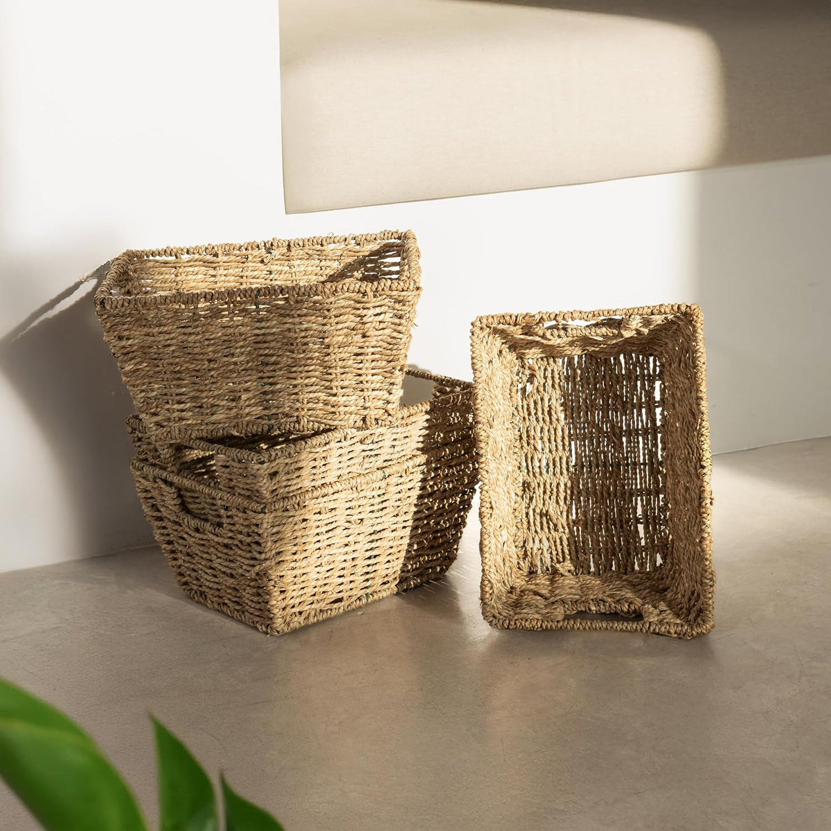 Nesting Seagrass Storage Baskets – Set of 4 – baskets grouped on a cabinet