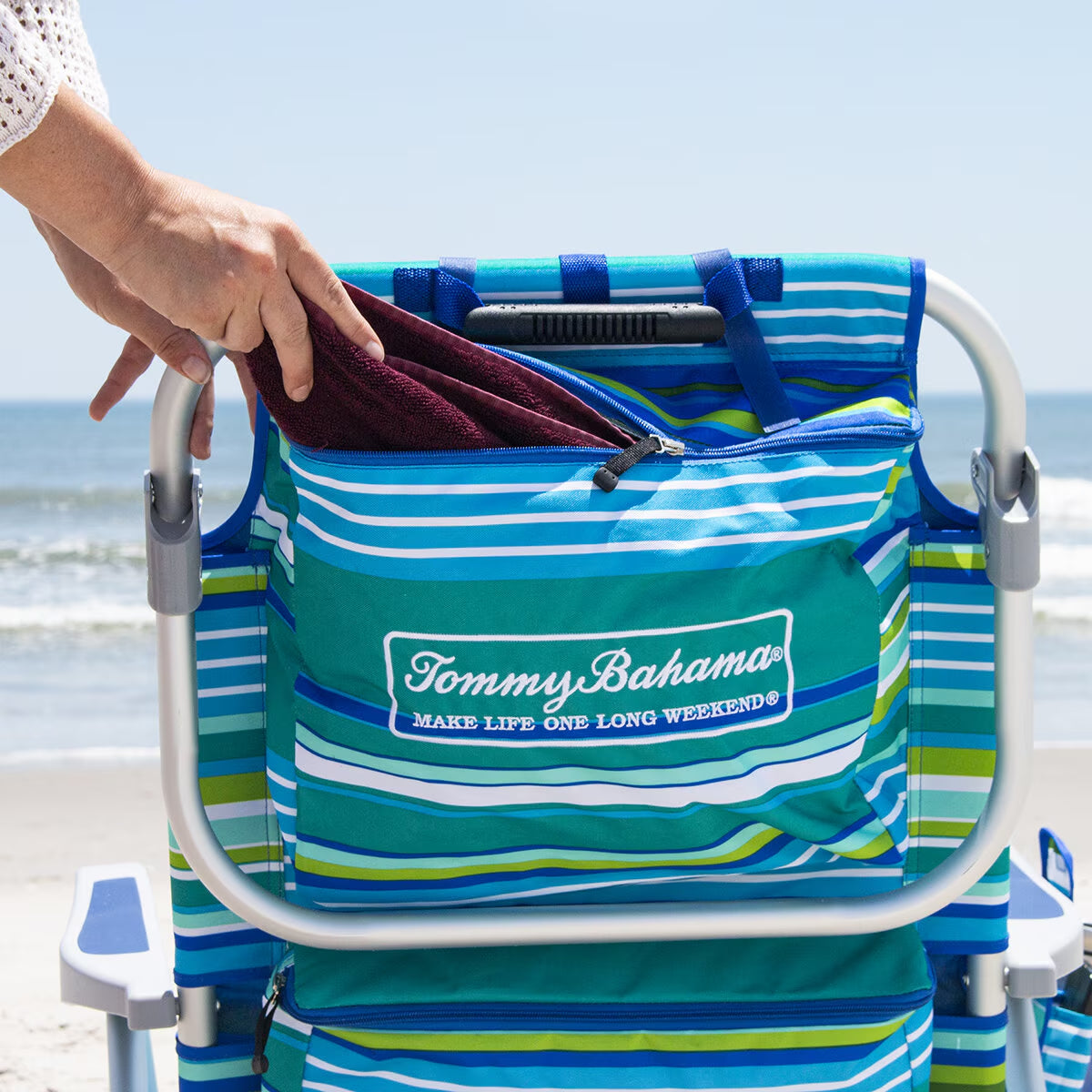Tommy Bahama beach chair with cooler bag, perfect for van life adventures and seaside relaxation