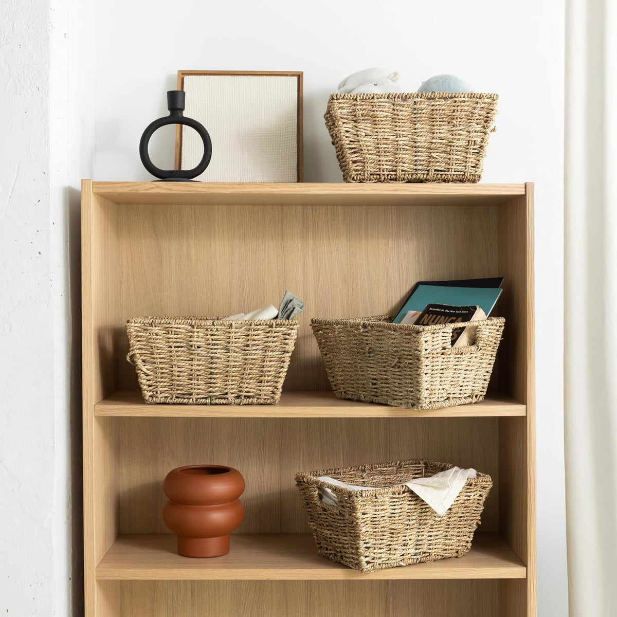 Nesting Seagrass Storage Baskets – Set of 4 – baskets organising a wood shelf