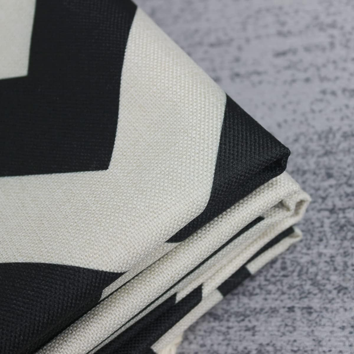 Black & Cream Geometric Cushion Covers – 4 Pack, 50cm – folded cushion fabric