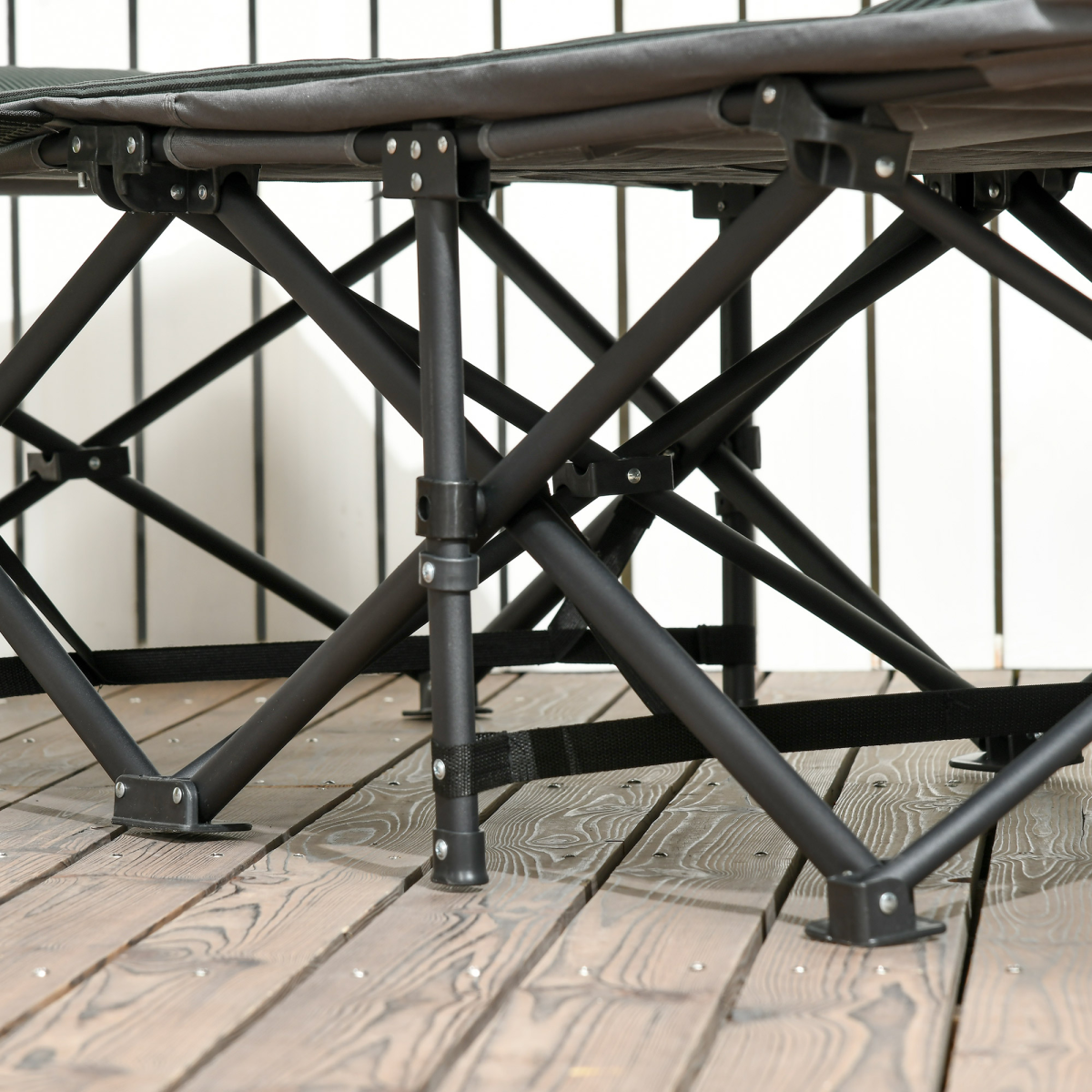 Sturdy black folding camp chair with metal frame, perfect for van life and outdoor adventures.