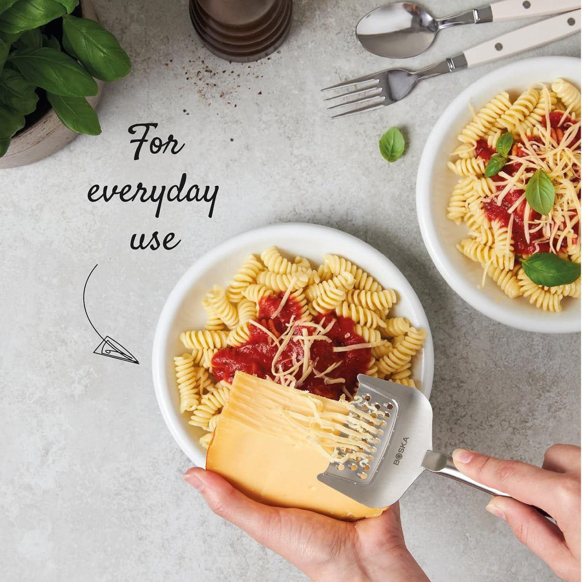 BOSKA Copenhagen Handheld Cheese Grater – grater used over pasta