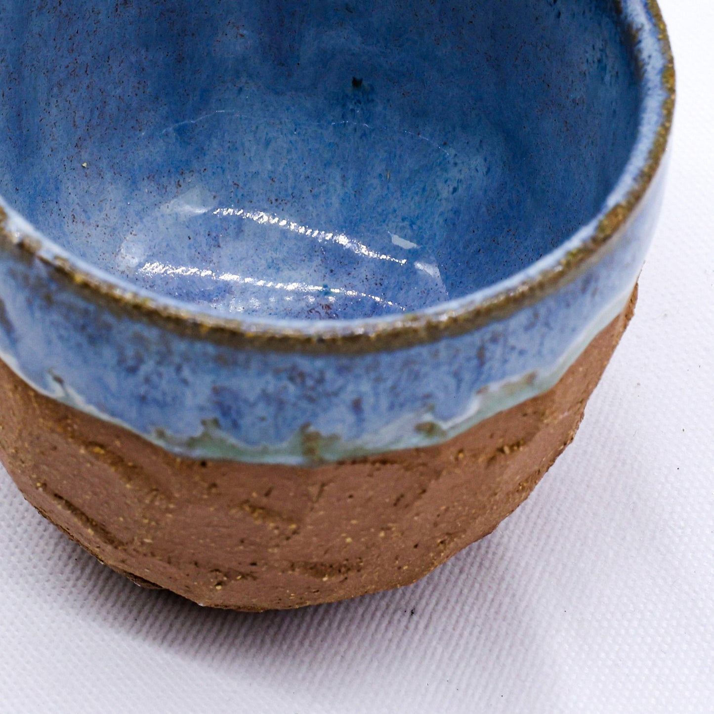 Handmade blue glazed ceramic cup for van life adventures, rustic outdoor camping gear