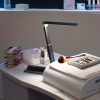 Compact LED desk lamp for van life, ideal for camper van interiors and portable workspaces