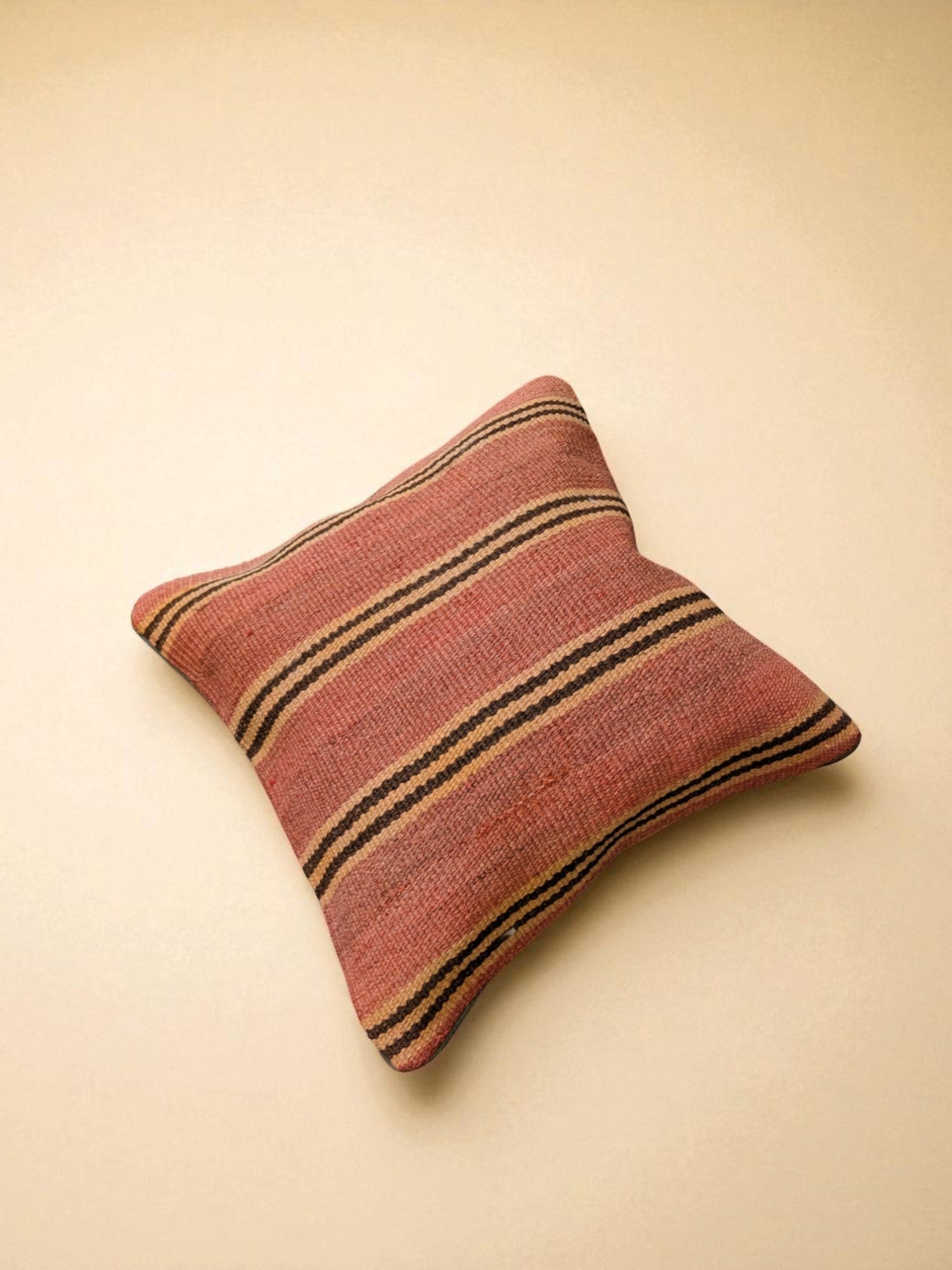 Rustic striped throw pillow for van life, camper van decor, and cozy outdoor adventures