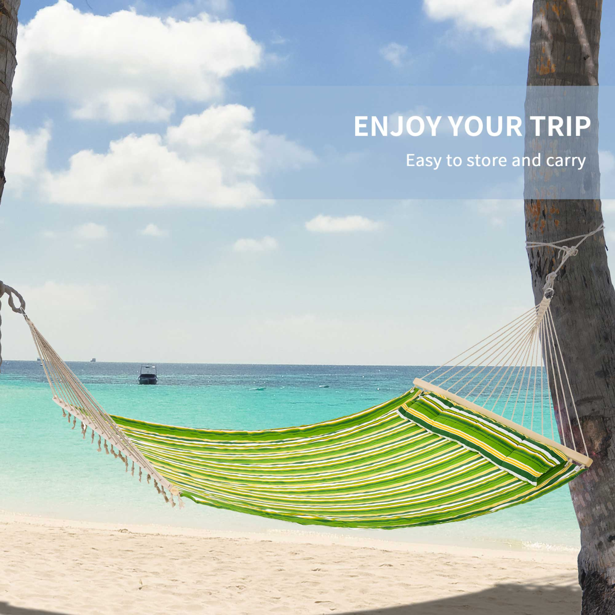 Green striped hammock between palm trees on tropical beach, perfect for van life adventures and outdoor relaxation.