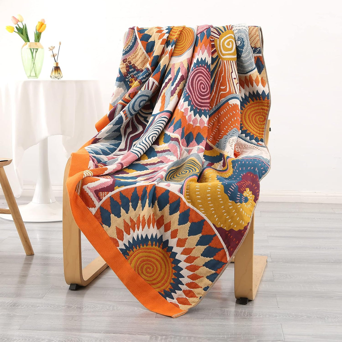 Bohemian Cotton Throw – 150 × 200cm – draped over an armchair