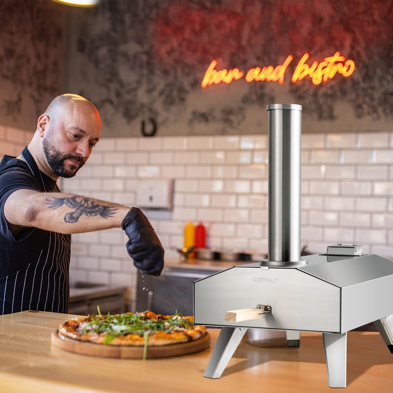 Portable stainless steel pizza oven for van life and outdoor cooking, perfect for campers and adventurers
