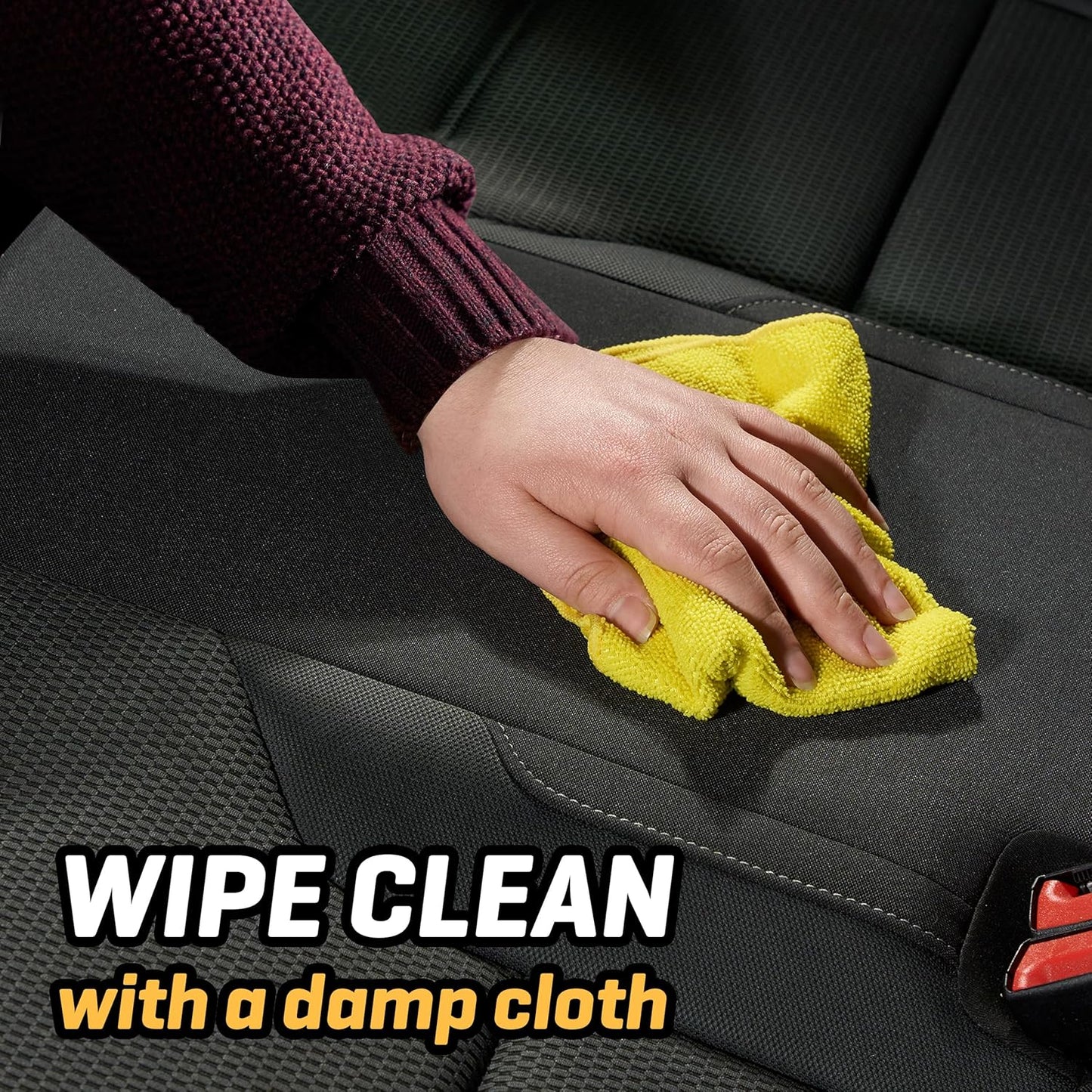 Wipe clean van seat with damp yellow cloth, ideal for camper van maintenance and van life essentials.