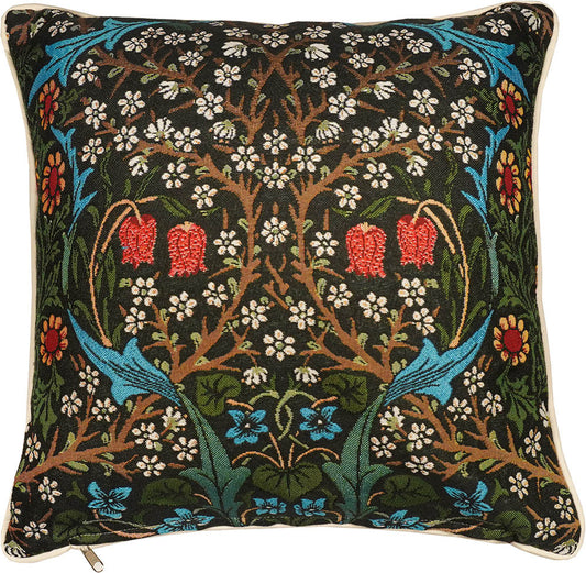 Boho floral tapestry pillow with red, blue, and white blooms for van life decor