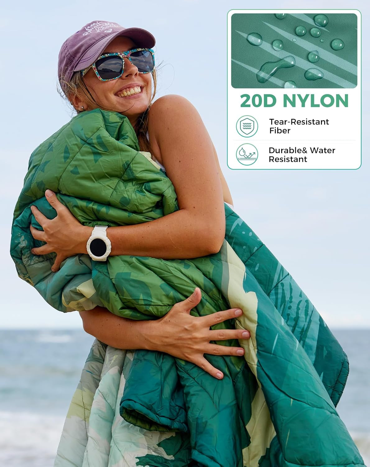 Woman hugging green camo sleeping bag, 20D nylon, water-resistant, ideal for van life & outdoor adventures