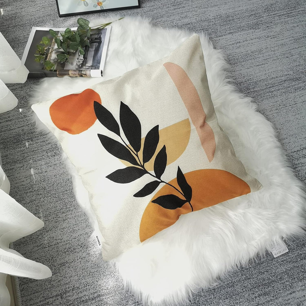 Orange Botanical Cushion Covers – 4 Pack, 50cm – orange circle design cushion on a sofa