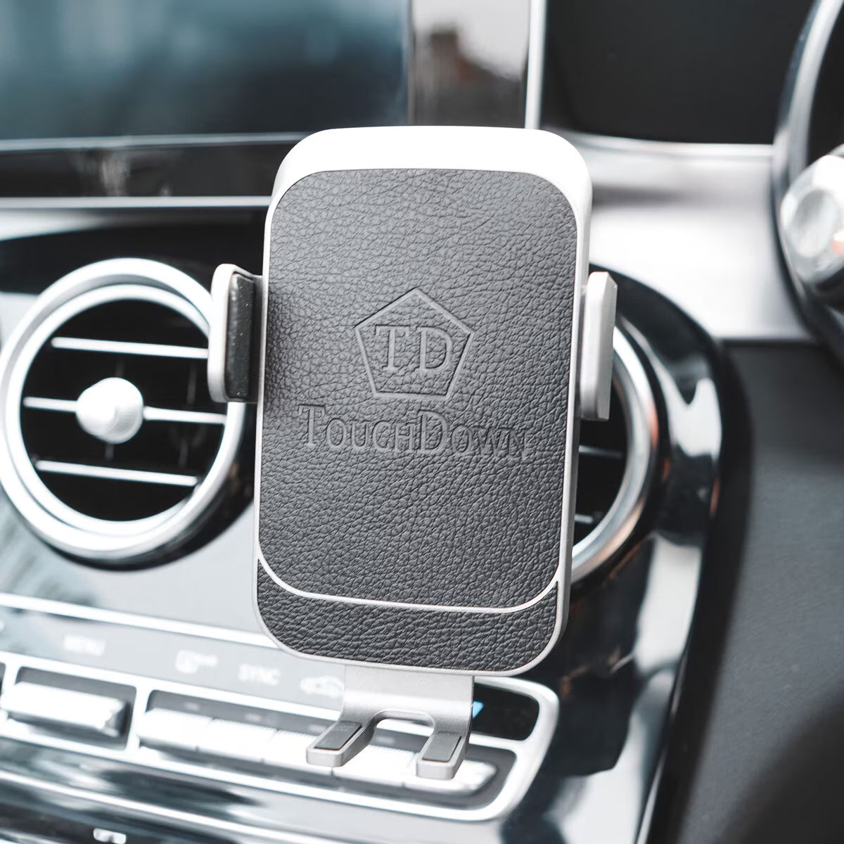 TouchDown car phone mount for van life, securely clips to air vent with textured grip