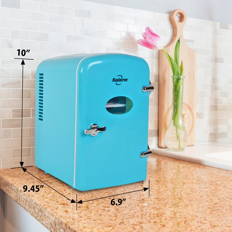 Compact turquoise Koolatron mini fridge for van life, 10" tall, perfect for camper van accessories and small spaces.