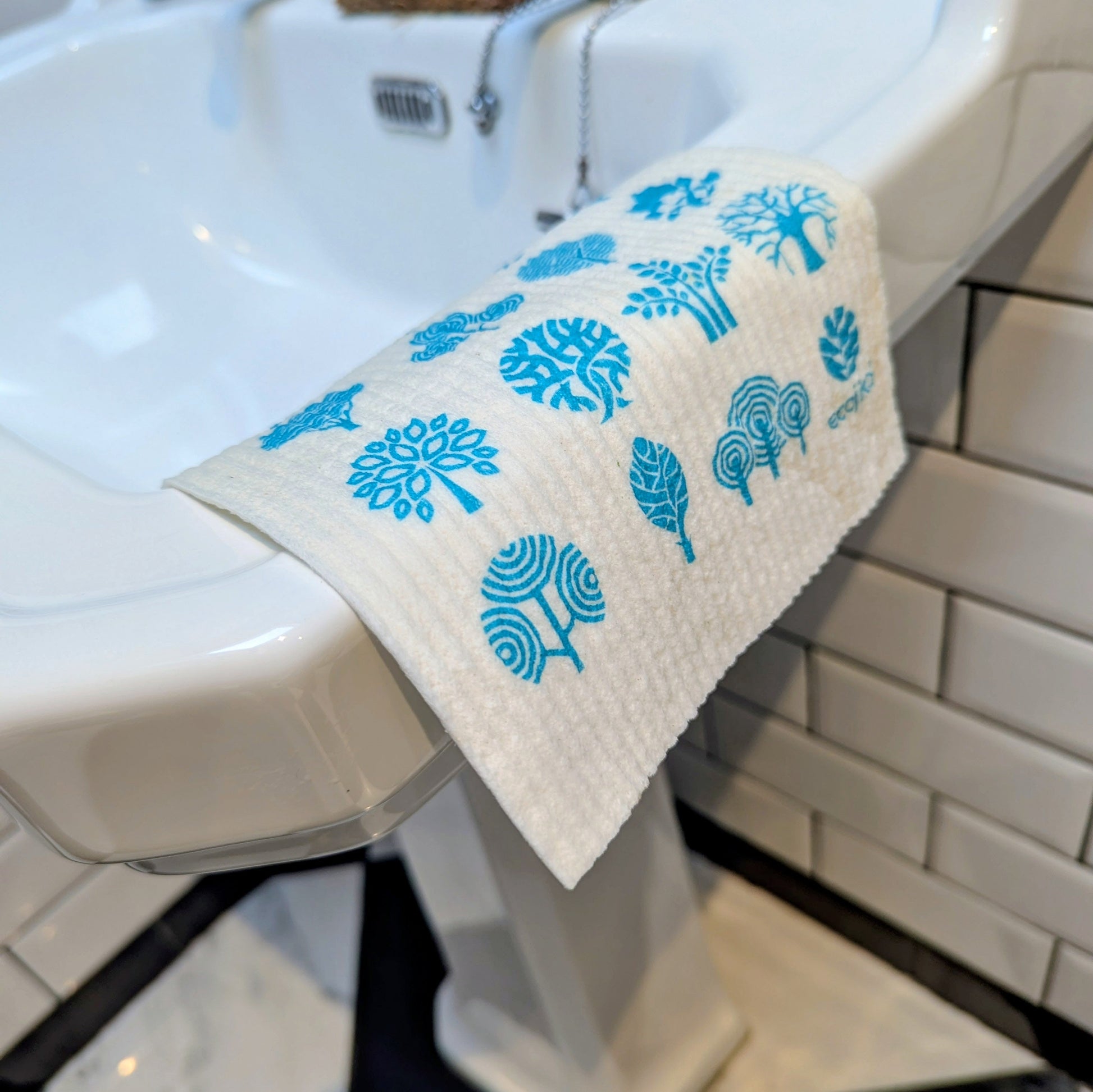 Eco-friendly tree-print dishcloth for van life kitchen, reusable & sustainable camper van accessory