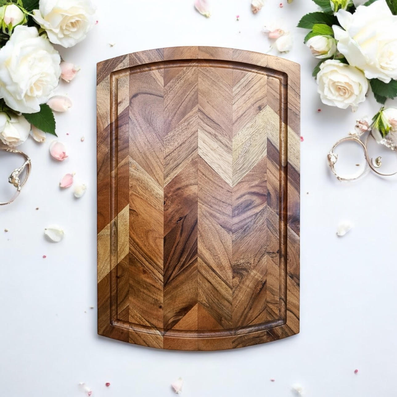 Wooden cutting board with herringbone pattern, perfect for van life kitchen essentials and outdoor adventures.