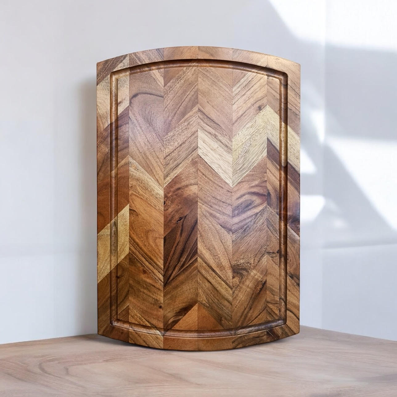 Wooden chevron cutting board for van life kitchen, compact camper van accessory with rustic design