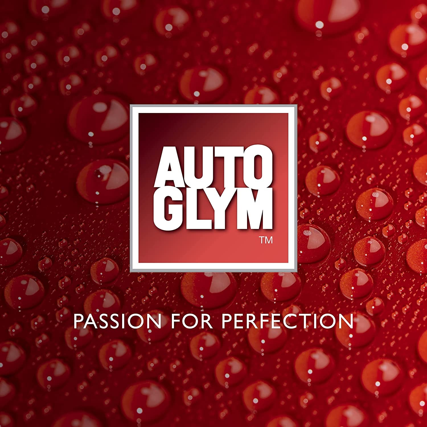 Autoglym logo on red surface with water droplets, 'Passion for Perfection' tagline
