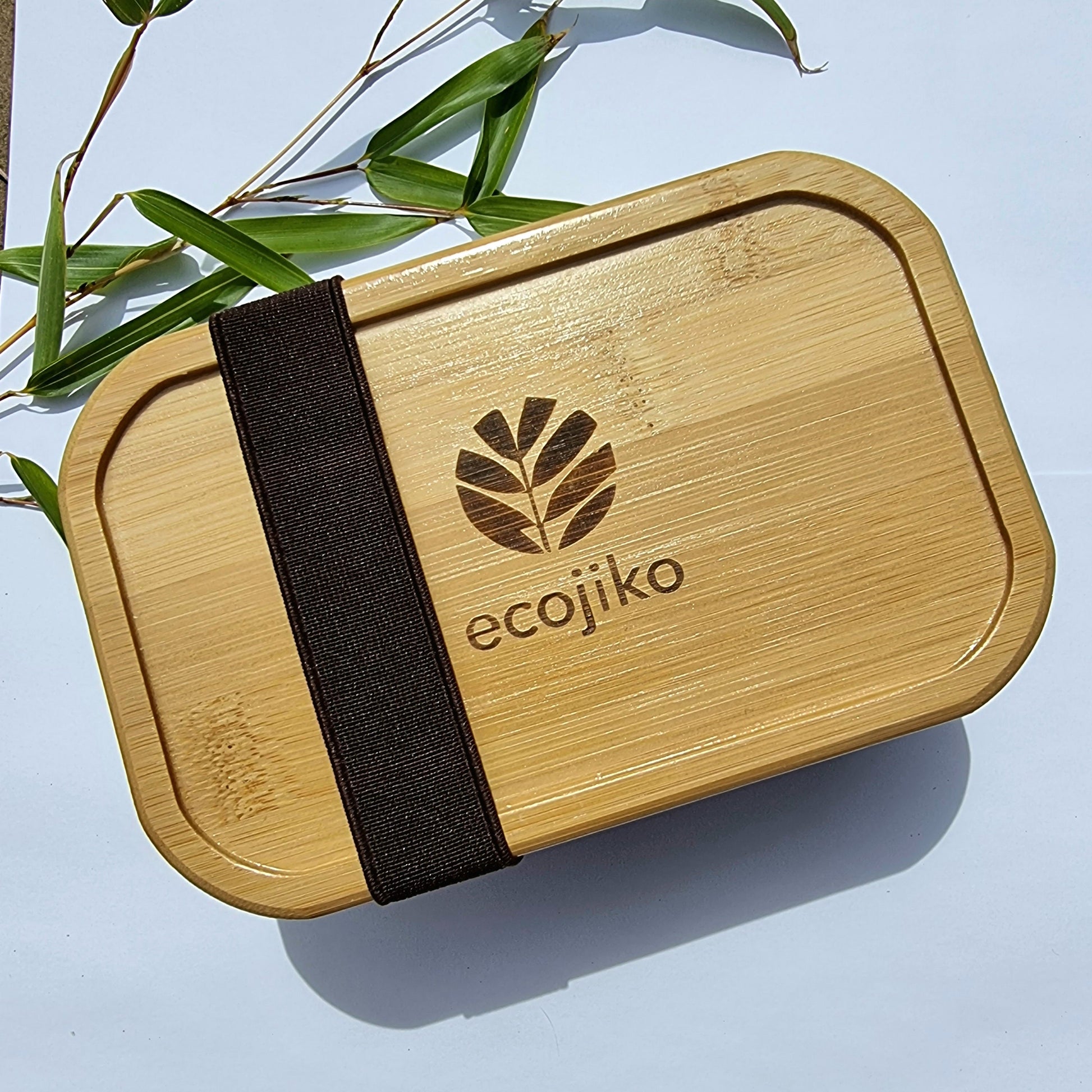 Ecojiko bamboo lunchbox with leaf logo, perfect for van life and outdoor adventures