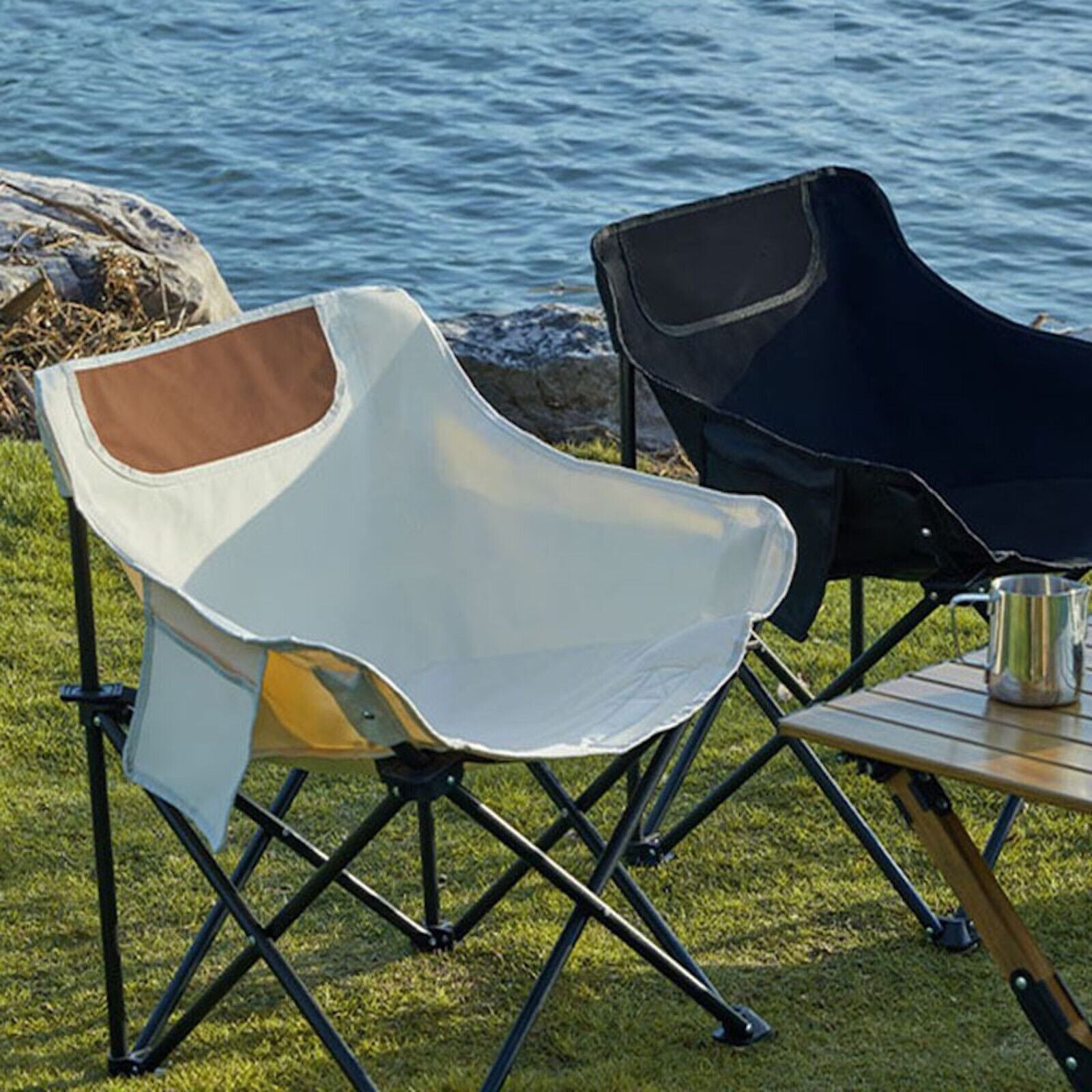 Portable camping chairs by water, perfect for van life and outdoor adventures