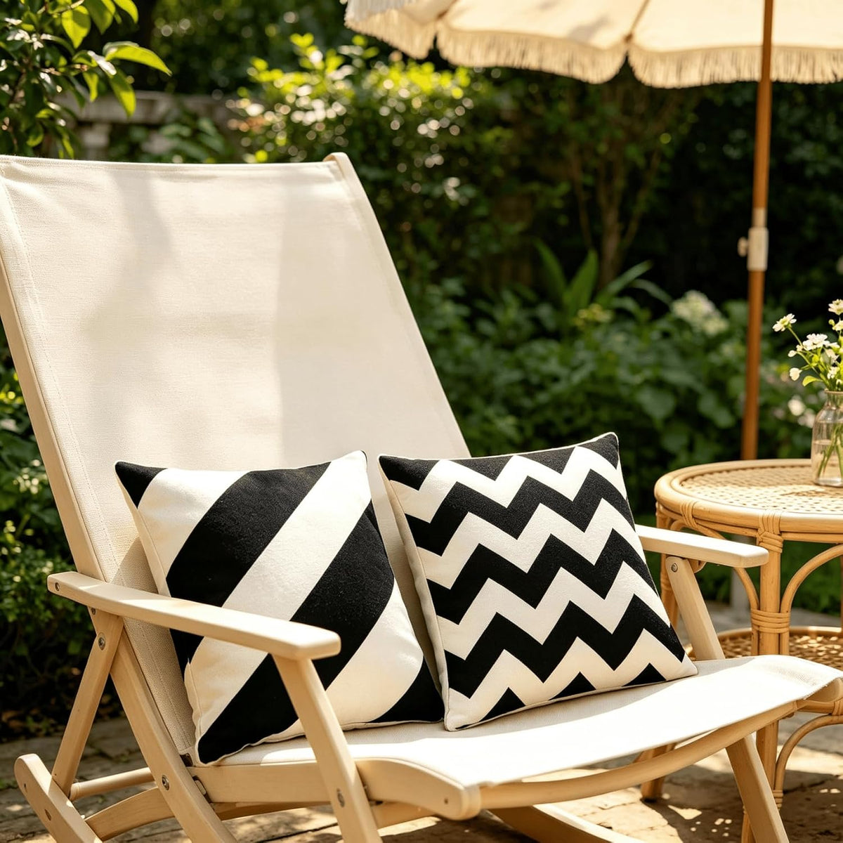 Black & Cream Geometric Cushion Covers – 4 Pack, 50cm – geometric cushions on an outdoor bench