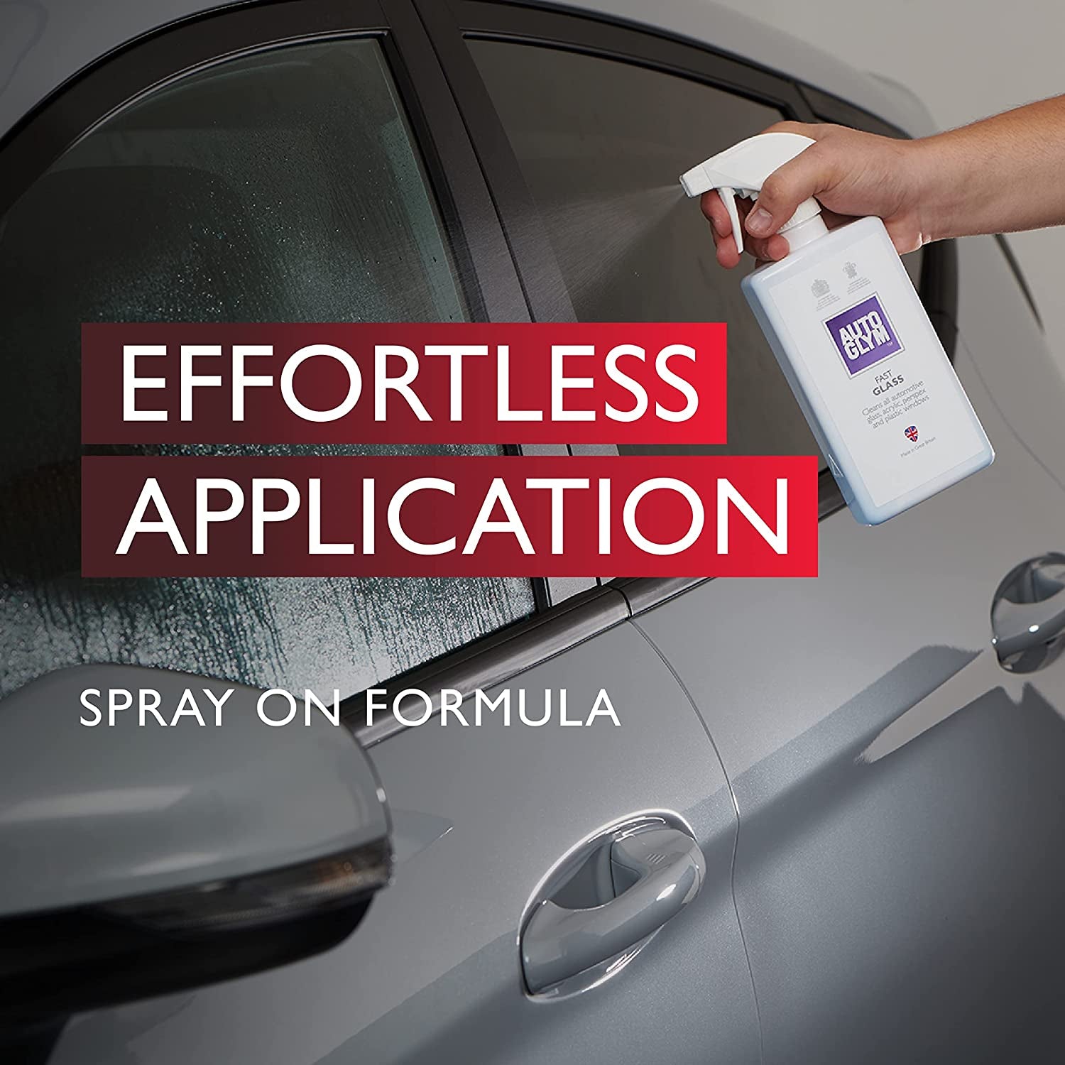 Hand spraying AutoGlym Fast Glass cleaner on car window for effortless van life vehicle care