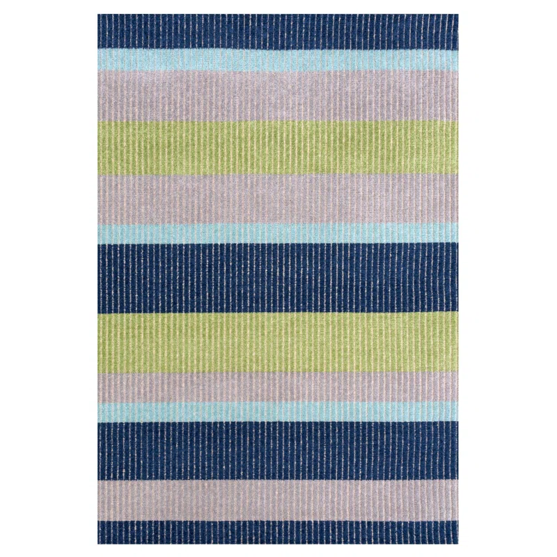 Striped outdoor rug with navy, mint, and lime green bands for van life or camping adventures