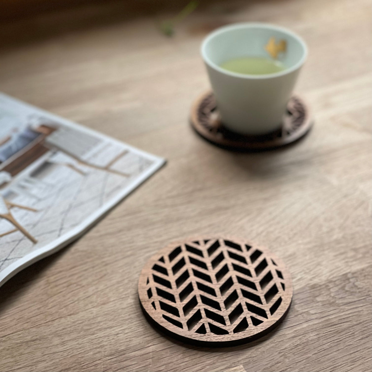 Wooden coasters with geometric cutout design for van life, camper van accessories, and outdoor adventures