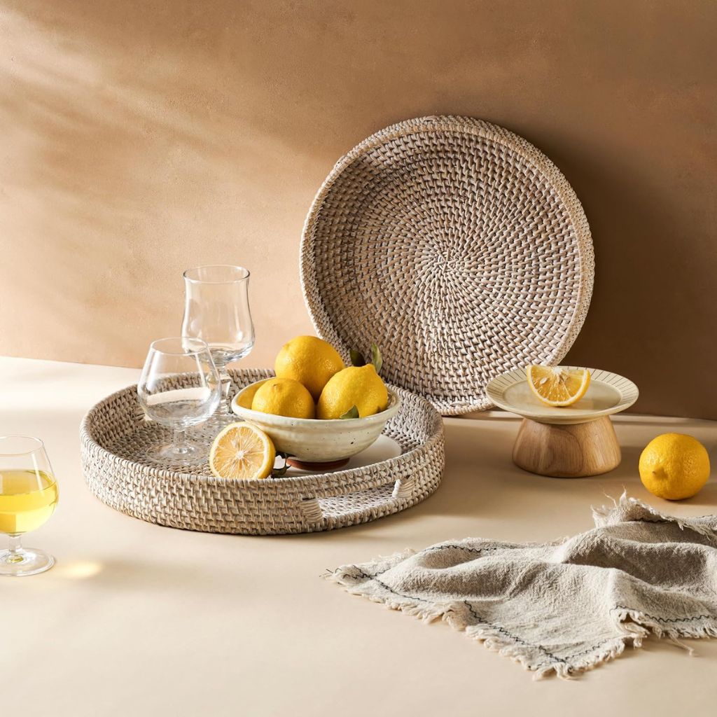 Woven rattan tray with lemons, glasses, and bowl for van life kitchen essentials
