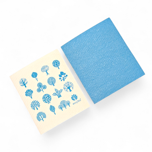 Eco-friendly blue tree-printed sponge and solid blue scrubber for van life cleaning essentials