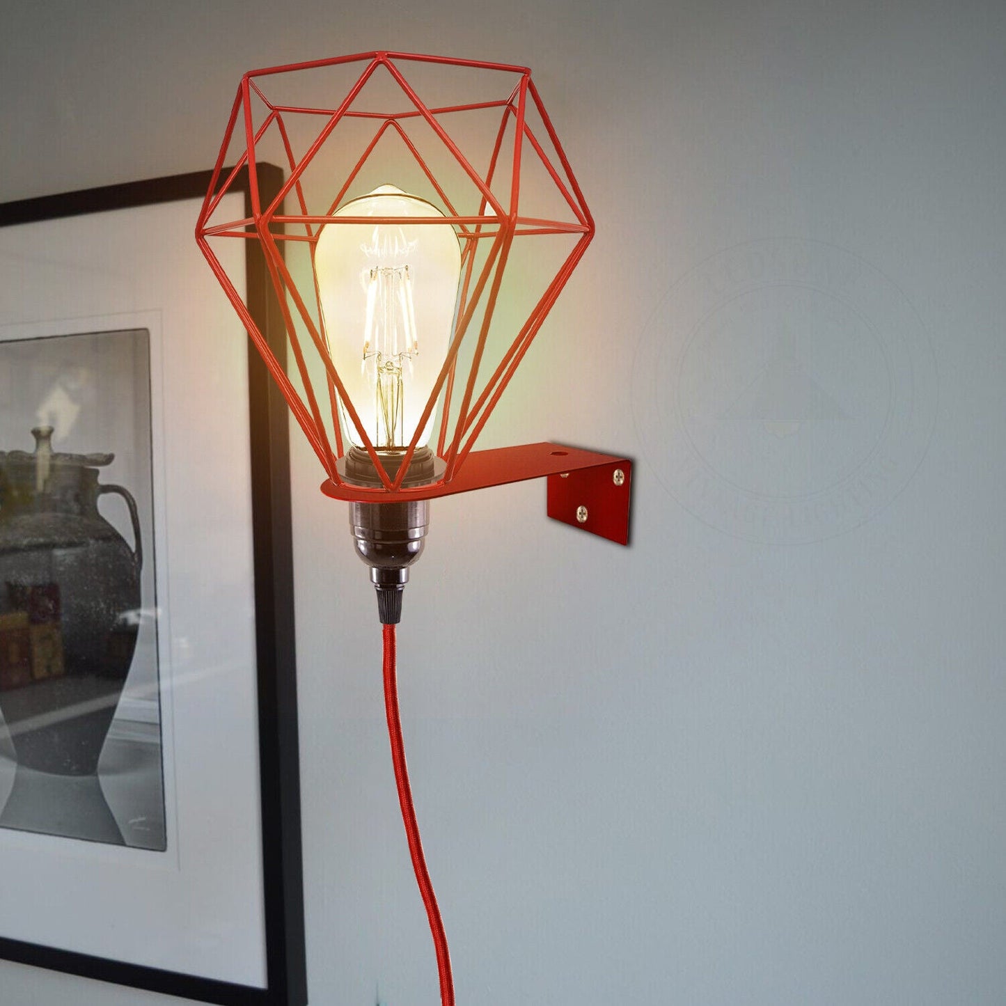 Red geometric wall lamp with Edison bulb, ideal for van life or camper interior lighting