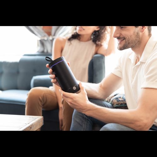 Portable Bluetooth speaker for van life adventures, compact design with LED light, perfect for camper vans and outdoor trips