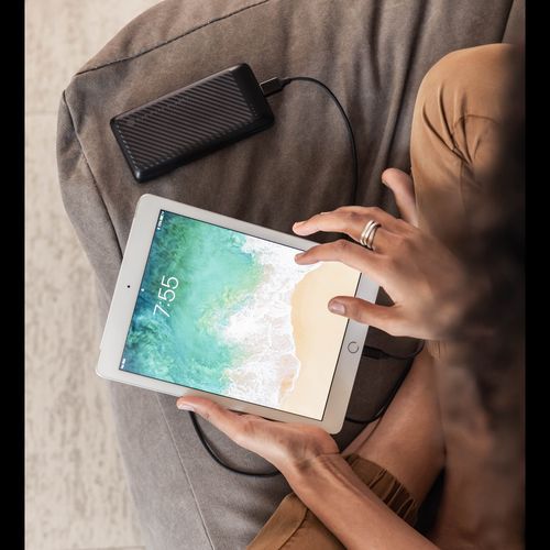 Portable power bank charging tablet for van life adventures and outdoor travel